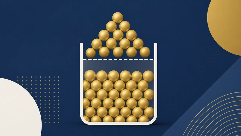 Contenedor con un nivel de llenado marcado y un volumen dorado que lo excede, que evoca la capacidad de absorción y su excedente.